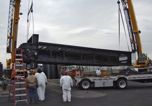 BAC team lowering large machine for service in Bridgeport, CT